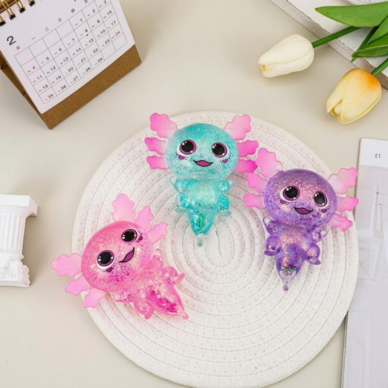 Axolotl squishy toy, made of glittery silicone, cute and adorable, chibi-style salamander design, slow-rebound squishy for stress relief, perfect for students and office workers, a great children's gift, and a stress-relieving toy.