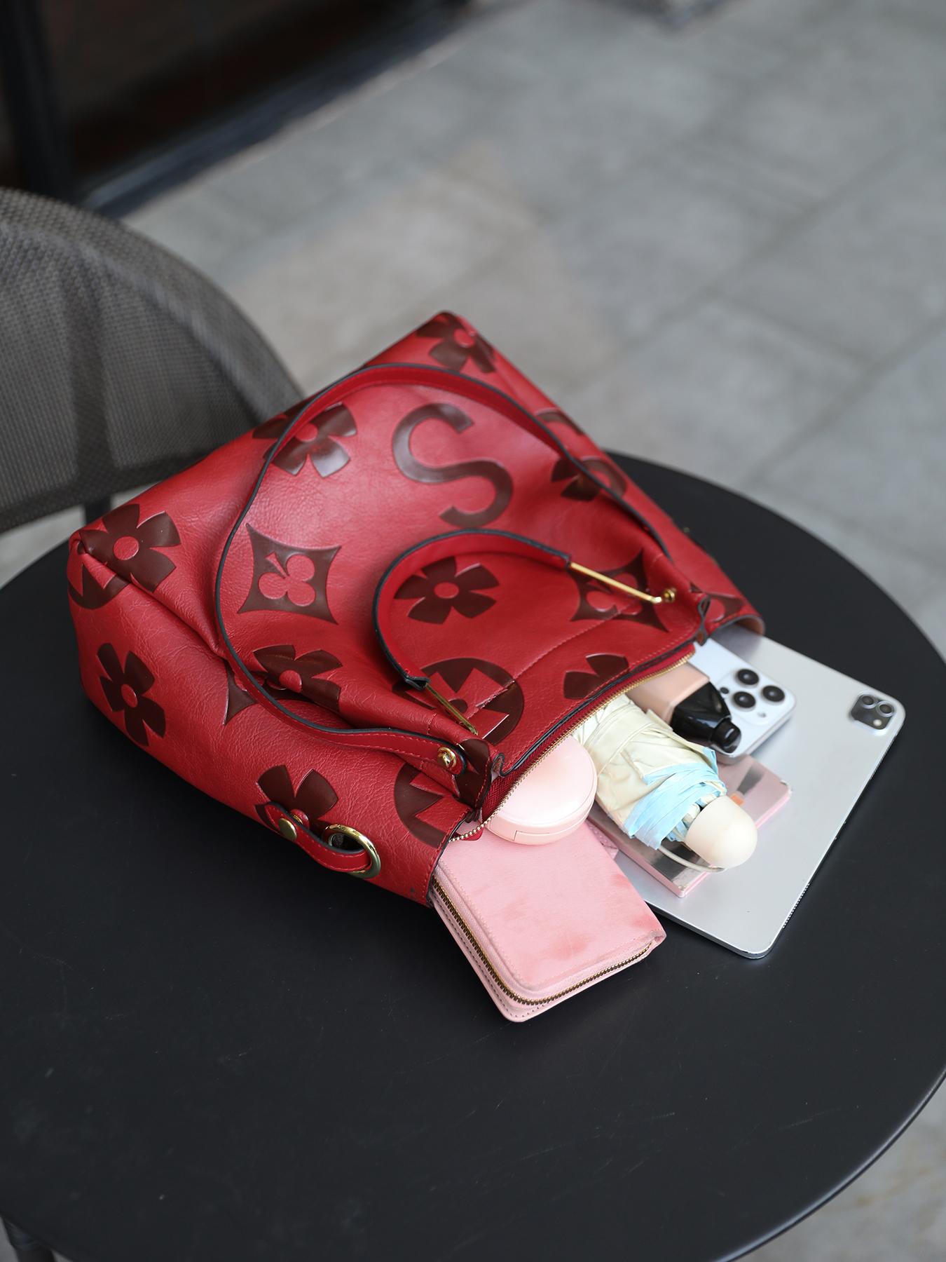 An elegant floral embossed faux leather handbag - suitable for women's use - fade resistant zipper tote bag - equipped with fixed shoulder straps - polyester lining - edge painted - suitable for work and various occasions