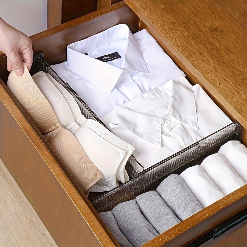 6-piece adjustable drawer dividers, freely extendable to fit various drawers. Ideal for clothing, kitchen and office storage. Made of sturdy durable material, keeping items neatly organized and saving space efficiently.