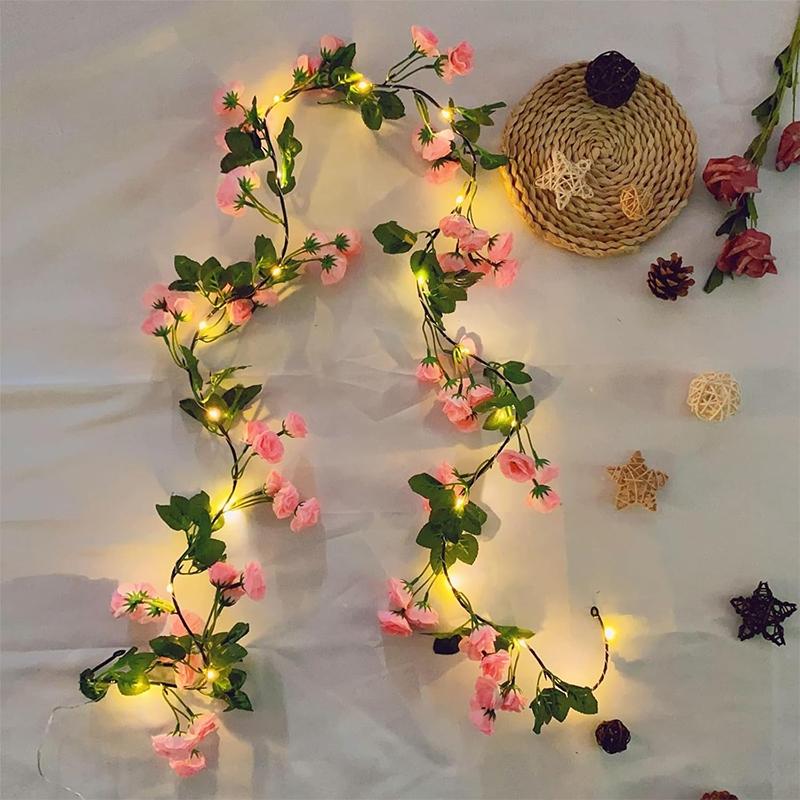One artificial flower string light, battery-powered simulated rose vine wreath light, 69 heads with 20 LEDs, silk hanging pink rose vine, suitable for weddings, parties, gardens, Christmas, Valentine's Day decorations.