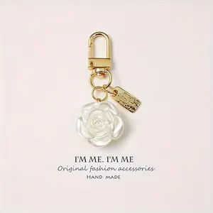 New Car Accessory Featuring a Rose, Bow, Pearl Tassel, And Keychain for Women