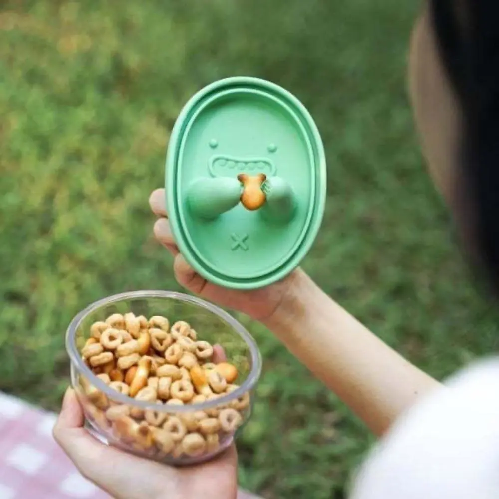 Portable Snack Container, Cylindrical ABS Plastic Cup with Flexible Silicone Cover with Finger Holes, Reusable Spill-Proof Holder for Travel & Camping, Lightweight, Mini Size, Outdoor Trips, Smooth