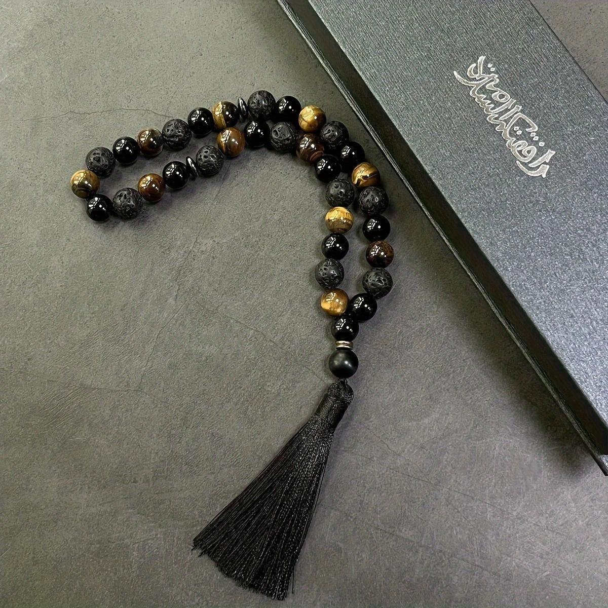 Handcrafted Bracelet Featuring 33 Beads Made of 10Mm Black Agate And Tiger'S Eye, Designed for Islamic Prayer And Pilgrimage. This Natural Stone Misbahah Serves As a Beautiful Accessory for Both Men And Women