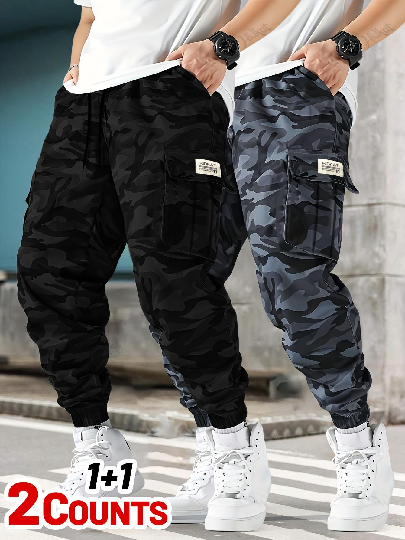 Men's 2-piece camouflage workwear, ankle tied casual pants Multi pocket drawstring elastic waist loose sports work pants two-piece set Outdoor military style camouflage work pants 2-piece combination