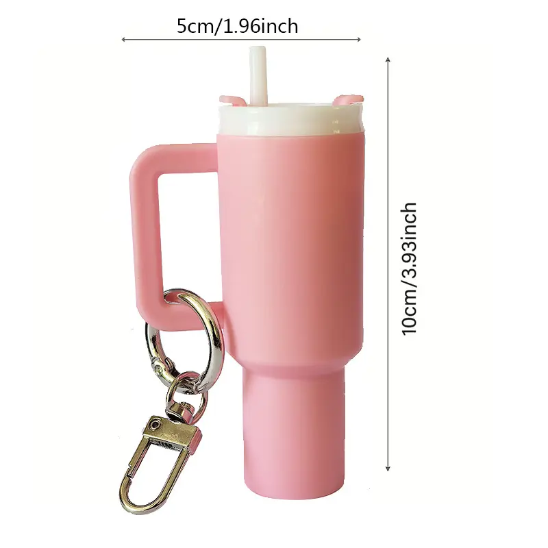 "Big Gulp" style tumbler keychain charm-holds lip balm; attaches to backpacks.