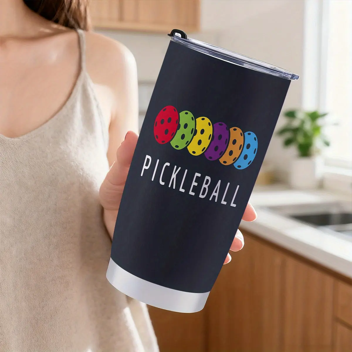 A Single Pickleball Ball Designed for a 20Oz Stainless Steel Cup That Comes with a Straw And Lid. This Insulated Tumbler Is a Stylish, High-Quality 600Ml Mug Suitable for Travel, Coffee, And Use in Cars, Making It a Great Gift for Home