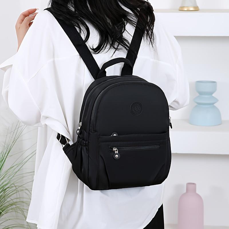 Chic Nylon Women’s Backpack – Versatile Stylish Bag with Adjustable Straps and Multiple Compartments for Work, Travel & School, Available in Gray, Purple, Black
