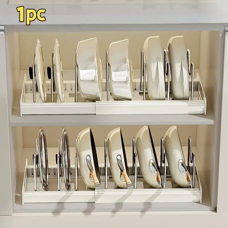 A kitchen storage rack Organization equipped with a retractable pot lid holder, cutlery rack, draining board and pull-out drawer.