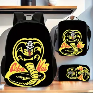 The iconic Cobra Yellow Stripe Black Base Three-Piece School Bag Set from Cobra Dojo Martial Arts Academy includes a backpack, insulated lunch bag, and pencil case, suitable for daily use by teenagers