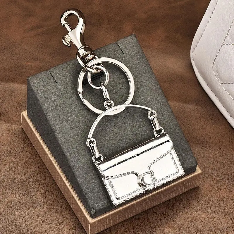 Elegant Alloy Mini Handbag-Shaped Keychain, Durable Metal Portable Accessory for Car Keys, Backpacks, Mini Keychain Party Gifts (Home & Festive Supplies), Fashion Design As Pictures