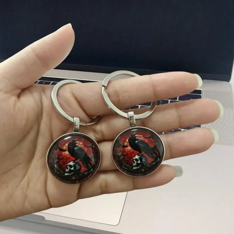 2pcs Crow Glass Keychain Pendant, Halloween Gift, Festival Gift, Friend Gift, Elegant Hanging Ornament, Skull Background Design