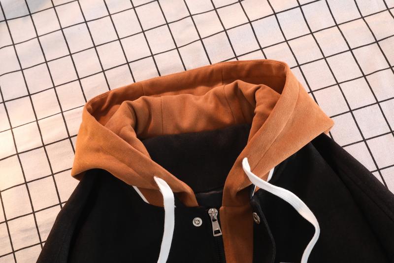 A hooded letter jacket, featuring a casual and simple style. The hooded design is sleek and elegant, while the overall design is practical and versatile. The letter embroidery adds a touch of sophistication, and the striped accent at the cuffs completes t A hooded letter jacket, featuring a casual and simple style. The hooded design is sleek and elegant, while the overall design is practical and versatile. The letter embroidery adds a touch of sophistication, and the striped accent at the cuffs completes t