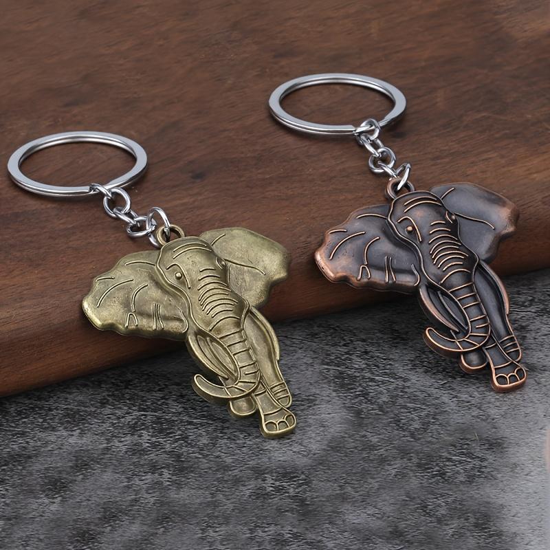 1. Vintage Zinc Alloy Elephant Keychain — Animal-Themed Key Ring. This keychain serves as a bag charm, travel souvenir, or gift.