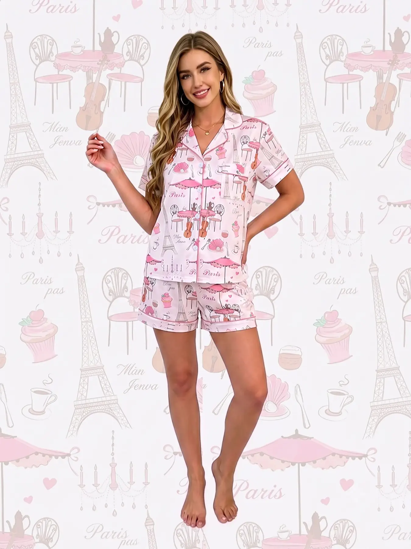 Women's 2-piece pajama set, light pink base with romantic French prints: Eiffel Tower, desserts, violins and Paris café patterns. Soft sweet French girly style. Pink trim, lapel top with pocket, elastic waist shorts, soft comfy all-season casual loungewea