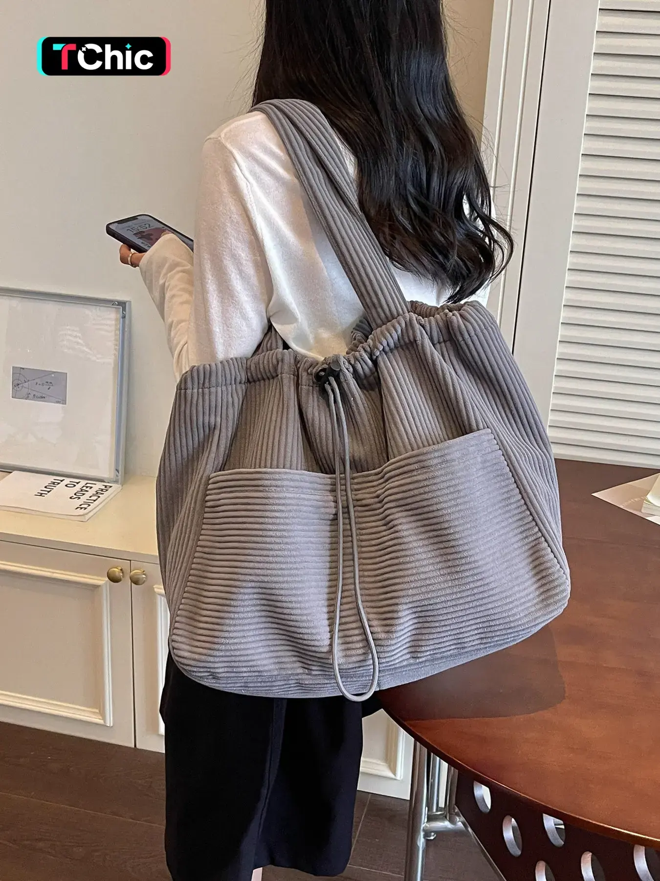 Large capacity vintage vertical corduroy drawstring tote bag with drawstring closure and anti drop design, spacious interior for storing books and computers, gentle and lazy style for exploring the store and traveling with a portable bag