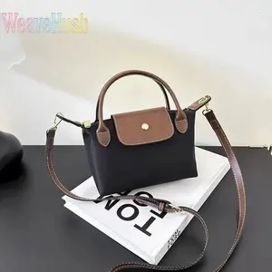 Stylish Nylon Mini Dumpling Bag, built with excellent waterproof performance. It can be worn as both crossbody and shoulder bag. Compact and practical design suits daily outings perfectly. Lightweight and durable, a handy everyday bag for all casual looks