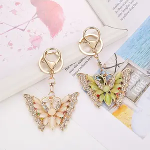 Rhinestone-Embellished Goddess Butterfly Car Key Fob with Cat's Eye Stone, Sparkling Handbag Charm Fashion Accessory for Women