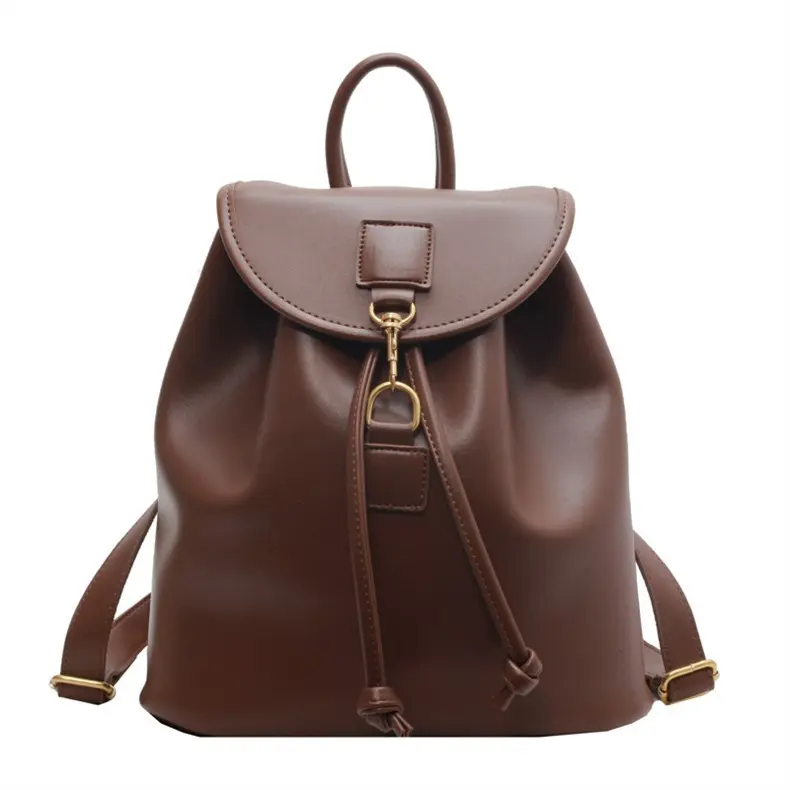 Minimalist leather drawstring backpack, compact women's bucket-style backpack, lightweight and stylish convertible shoulder/backpack for women.