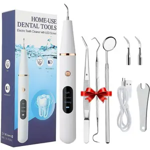 Ultrasonic dental cleaner with multiple replaceable tips gently helps remove tartar and stains, USB rechargeable and portable — your easy at-home oral care companion for adults.