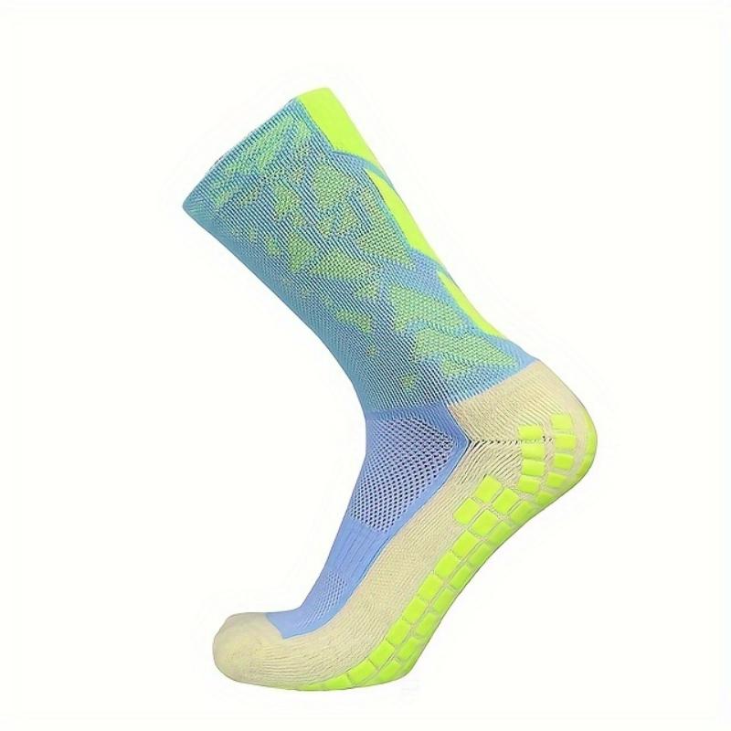 A Pair of Men'S Mid-Calf Football Socks, Designed with a Thick Towel Bottom for Enhanced Grip And Durability