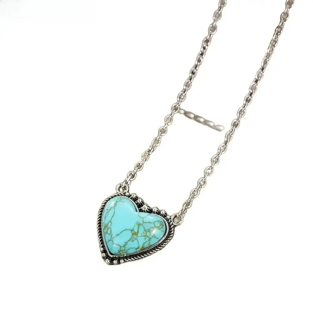 Women’s statement necklaces | Viral turquoise heart pendant necklace with silver chain | Niche western-style boho necklace with sunburst accents | Large natural turquoise stone, vintage silver finish, perfect for cowboy outfits, everyday wear and festival