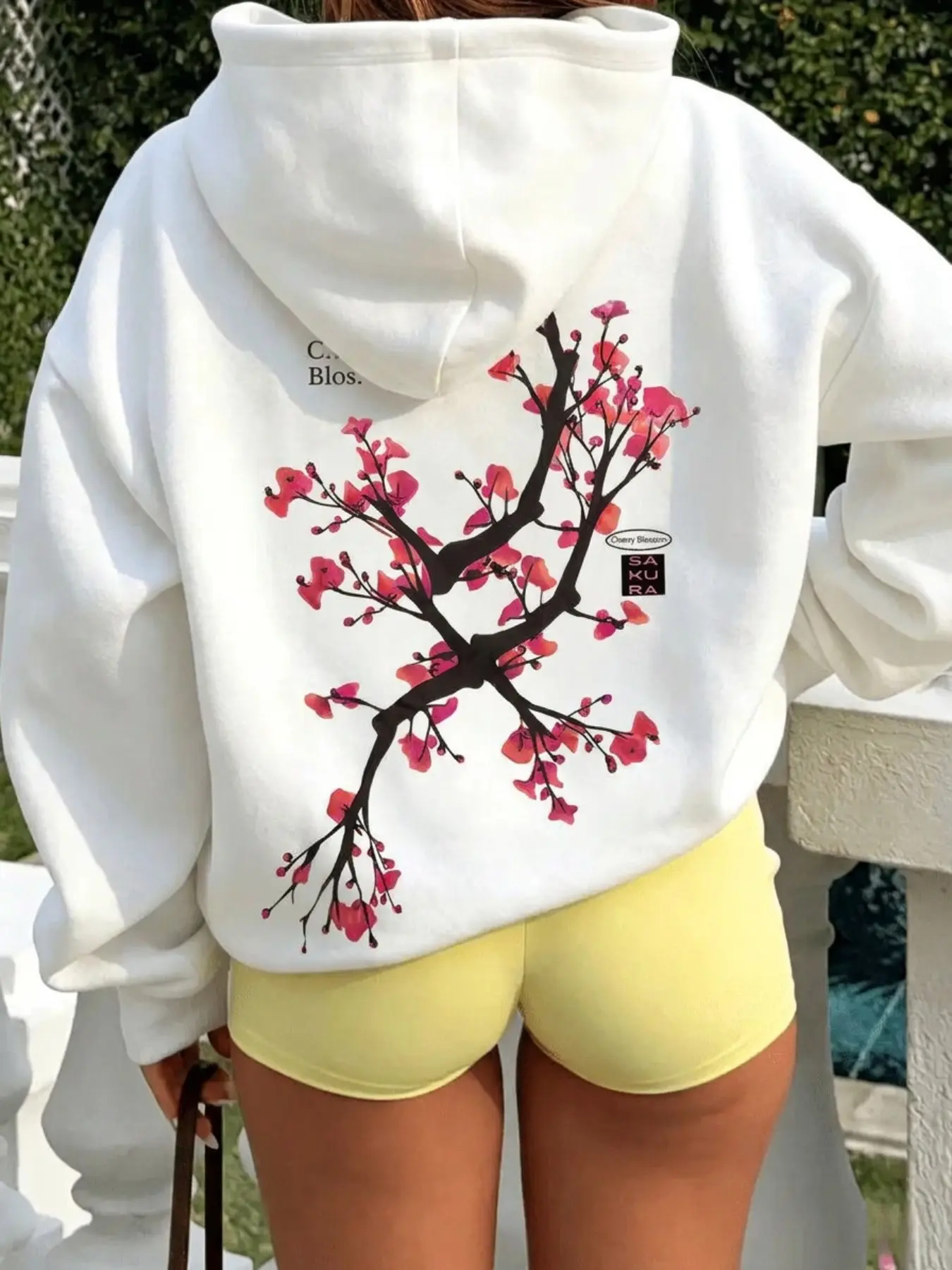 Women's Oversized White Hooded Sweatshirt, Japanese-Style Pullover with Cherry Blossom Branch Print on the Back, Long-Sleeve Loose-Fit Hoodie. It photographs beautifully from the back with a unique gentle design that avoids duplicate styles, ideal for cas
