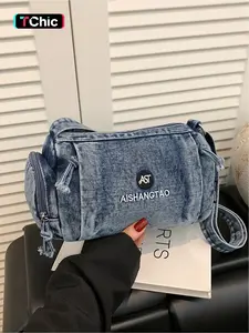 Mini washed distressed black and grey denim cylinder crossbody bag, featuring double-sided frayed drawstring and double zipper design, embroidered letter logo paired with a widened adjustable long shoulder strap, street vintage style shoulder bag for stor