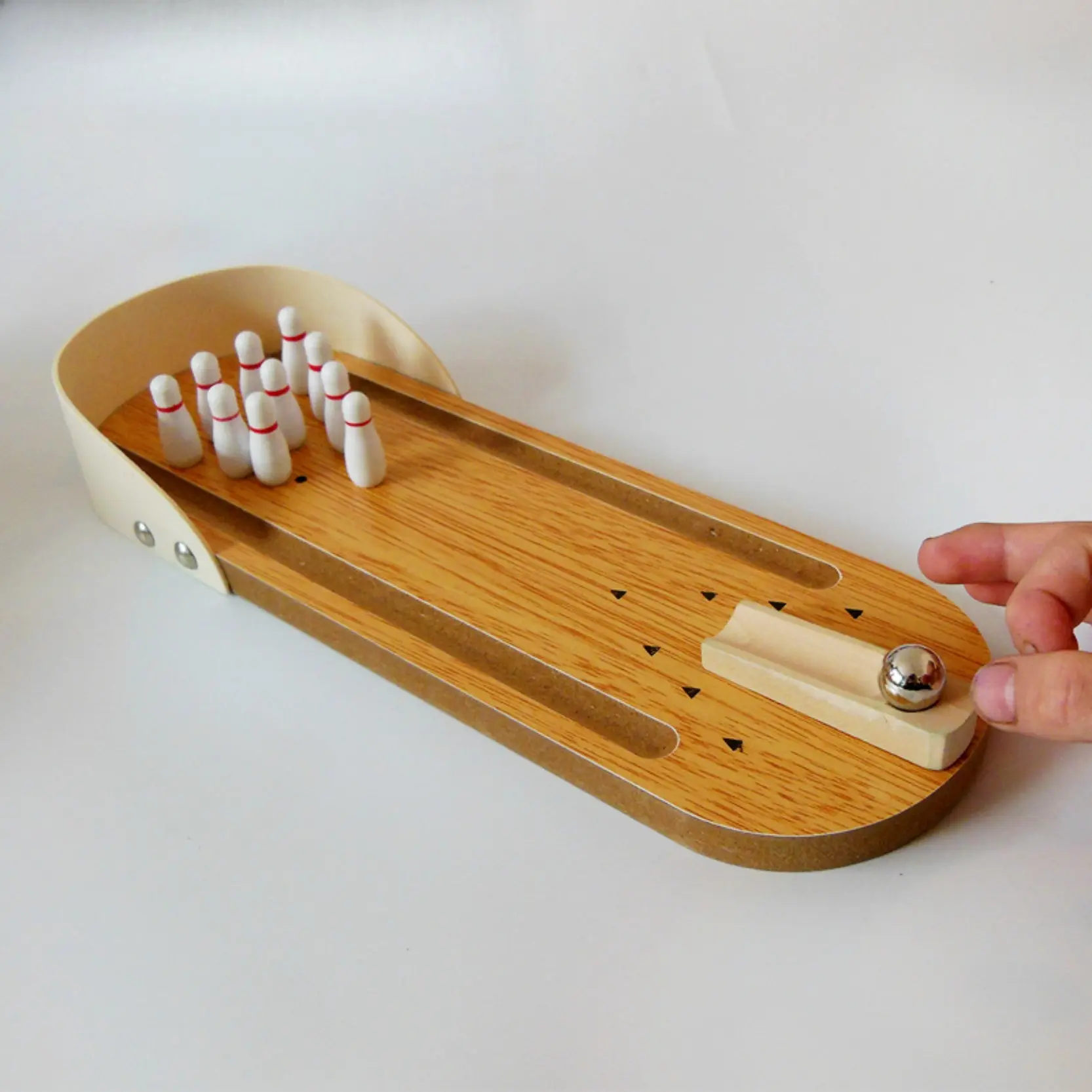Mini bowling table game, portable table bowling set, includes mini pins and balls, fun table party game, family interactive toy, suitable for game nights, travel and indoor entertainment.