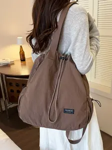 1pc Ladies' drawstring nylon backpack with rope cloth tag decoration, large capacity lightweight backpack for campus commuting, short distance travel, simple casual wear essential item
