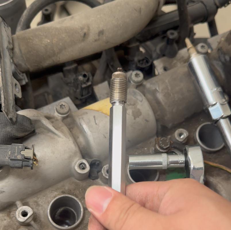 Spark plug removal tools, reverse thread taps, spark plug removal screws, automotive spark plug removal tools