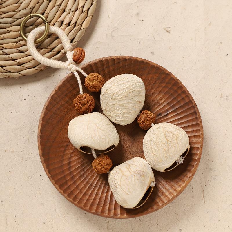 Naturally handcrafted fruit shell bell, with seeds, sound therapy handbell, wish-fulfilling fruit bag ornament, Yunnan specialty gift, mobile phone decoration accessory