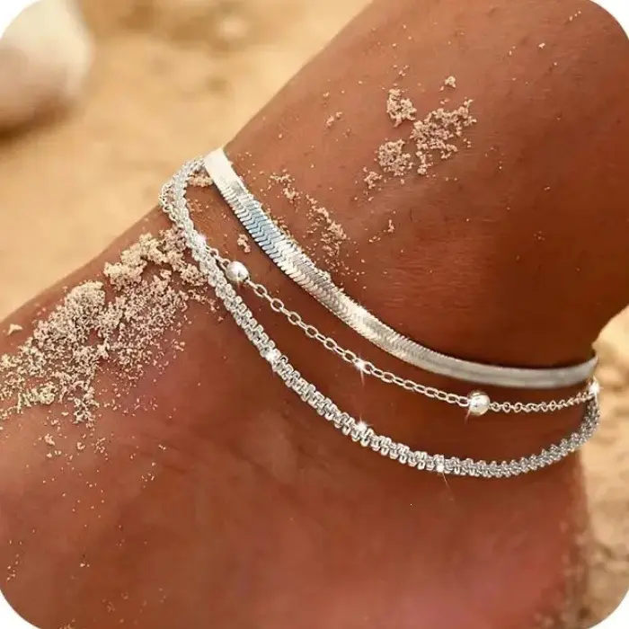 Women's 3-Piece Layered Female Anklets Set - Stainless Steel Herringbone Link, Beaded Link, Textured Multi-Chain Foot Jewelry with Layered Look for Beach, Summer Outfits