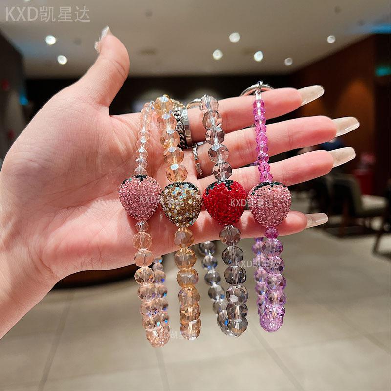 Premium sense rhinestone strawberry mobile phone chain crystal wrist beaded lanyard anti-drop crystal mobile phone chain anti-lost key chain Wireless Charm Aesthetic Cloth Smartphone Cellphone