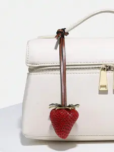 Exquisite and cute retro personalized strawberry pendant, knot design that is not easy to fall off, can be used as a bag hanger and keychain, sweet and artistic style fashionable texture decoration, can be given as a gift to friends