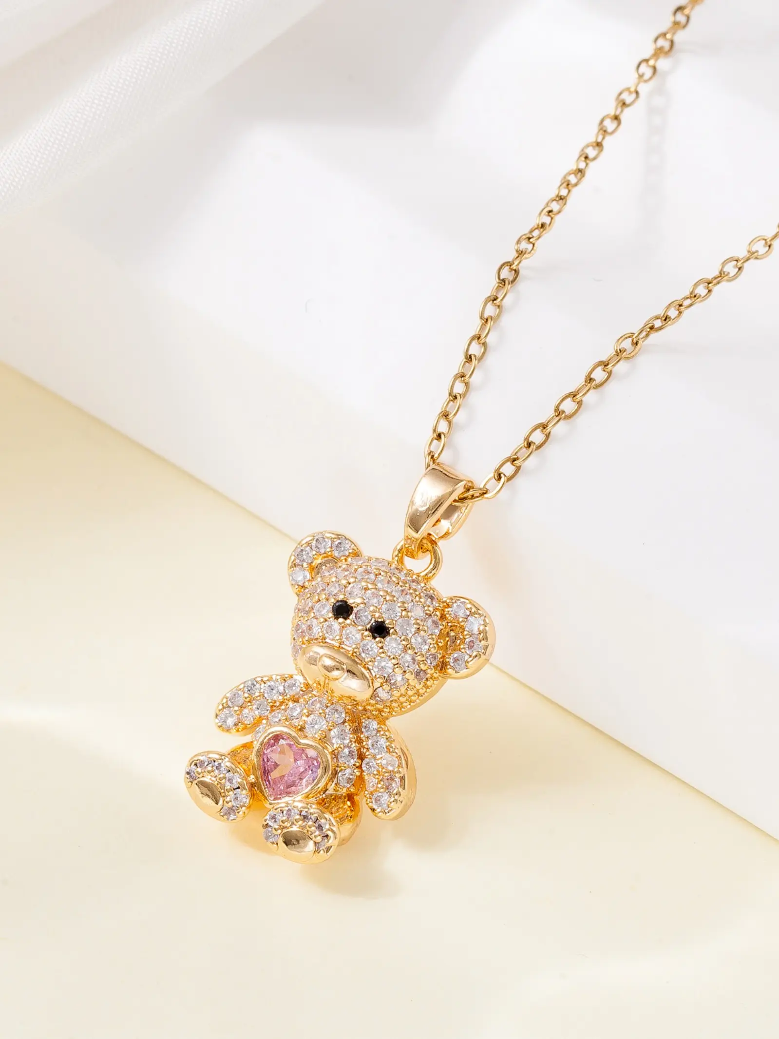 1pc luxury sweet stainless steel necklace with a full pavé synthetic zirconia teddy bear pendant, an elegant pink heart bear collarbone chain that does not fade, a fashionable sweater chain, a perfect accessory for dating outfits, and an ideal gift.