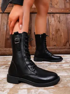 Mid-calf combat boots with front laces & side zipper, low square block toe crafted from soft leather. Cool versatile silhouette slims legs, perfect for commuting and street styling alike.