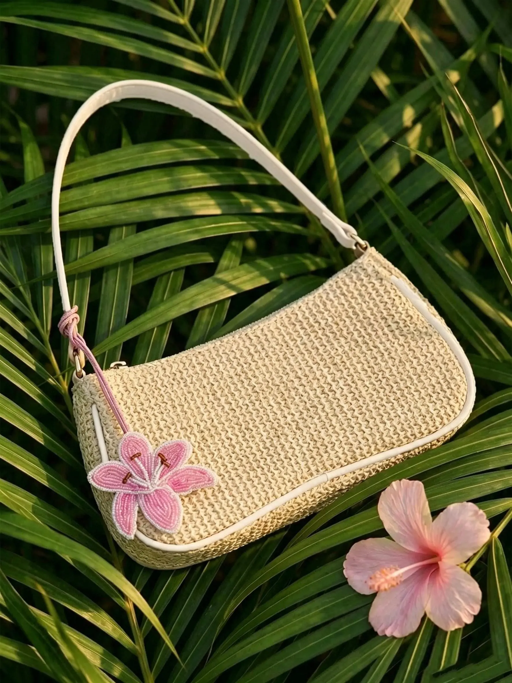 Beige woven rectangular Boho shoulder bag, handmade bead pink lily pendant, versatile underarm handbag, minimalist Bohemian summer wallet, suitable for beach vacations, daily shopping, casual streetwear, and young women's holiday travel combinations