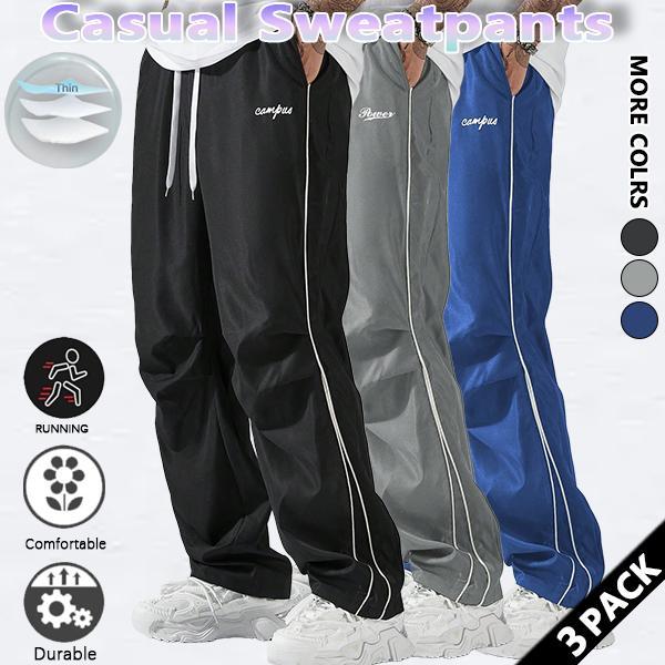 Loose-fitting sweatpants for men, grey side stripes with gold accent stripes, comfortable design, sports casual style bottoms, sweatpants, fitness wear, today's fashion outfit