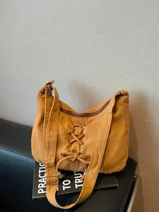 1pc Ladies' drawstring canvas underarm bag with cross tie bow design, adjustable wide shoulder strap, zipper inside, soft and large capacity shoulder bag, essential item for daily commuting, retro and casual wear