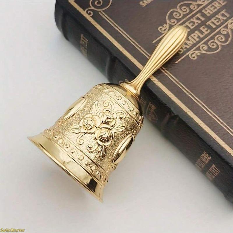 Elegant Polished Brass Handbell—a classic, traditionally designed decorative bell, perfect for weddings, parties, holidays, and various ceremonial celebrations. Meticulously crafted from high-quality, durable metal, this handbell makes an ideal gift for h