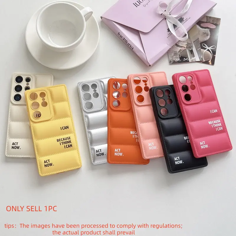 Soft puffer grid phone case printed with inspirational English slogans, full-coverage air cushion anti-collision design, matte solid colors in various shades with minimalist premium vibe, compatible with Samsung S23/S24/S25/S26 series
