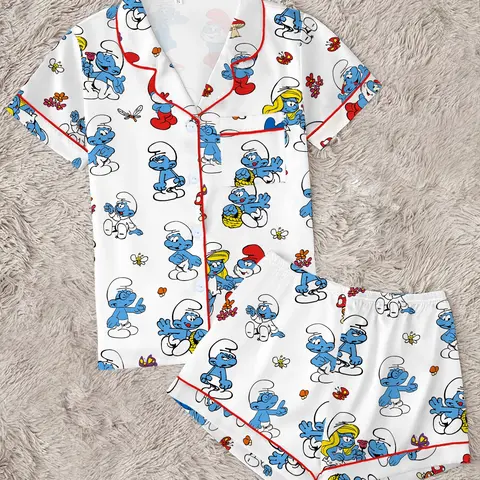 Trendy 80s Nostalgic Cartoon Pajama Set | Cute Blue Elf Graphic Print Sleepwear | Soft Short Sleeve Button Down Lounge Outfit with Red Piping | Kidcore Summer PJs, PJ Sets