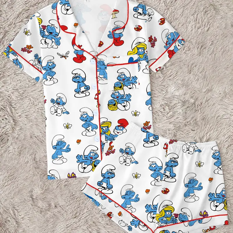 Trendy 80s Nostalgic Cartoon Pajama Set | Cute Blue Elf Graphic Print Sleepwear | Soft Short Sleeve Button Down Lounge Outfit with Red Piping | Kidcore Summer PJs, PJ Sets