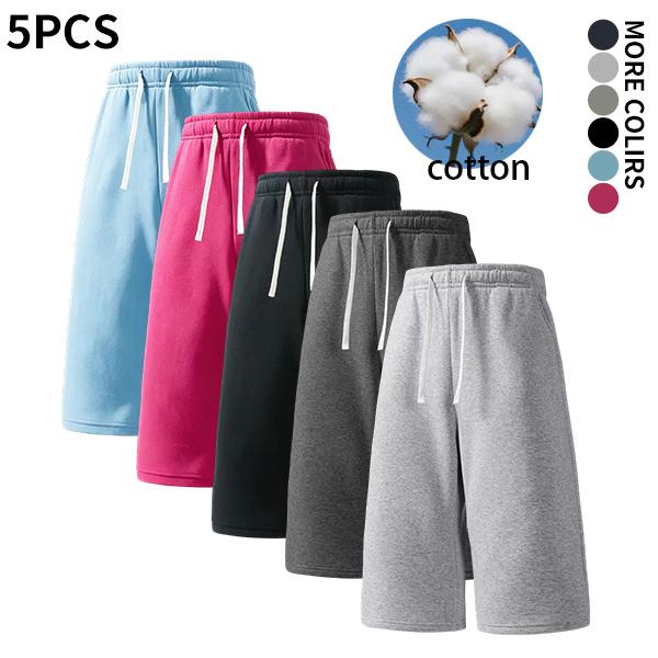 Relaxed knee-grazing cotton sport shorts equipped with elastic drawstring waist soft breathable natural cotton material wide leg loose silhouette durable casual bottom essential active staple for versatile contemporary sport mensfashion looks