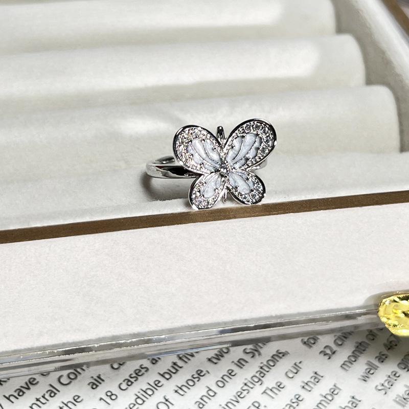 Fashionable vintage-style sweet and cool white enamel butterfly and Saturn fashion ring for women, niche minimalist geometric personalized ring gift
