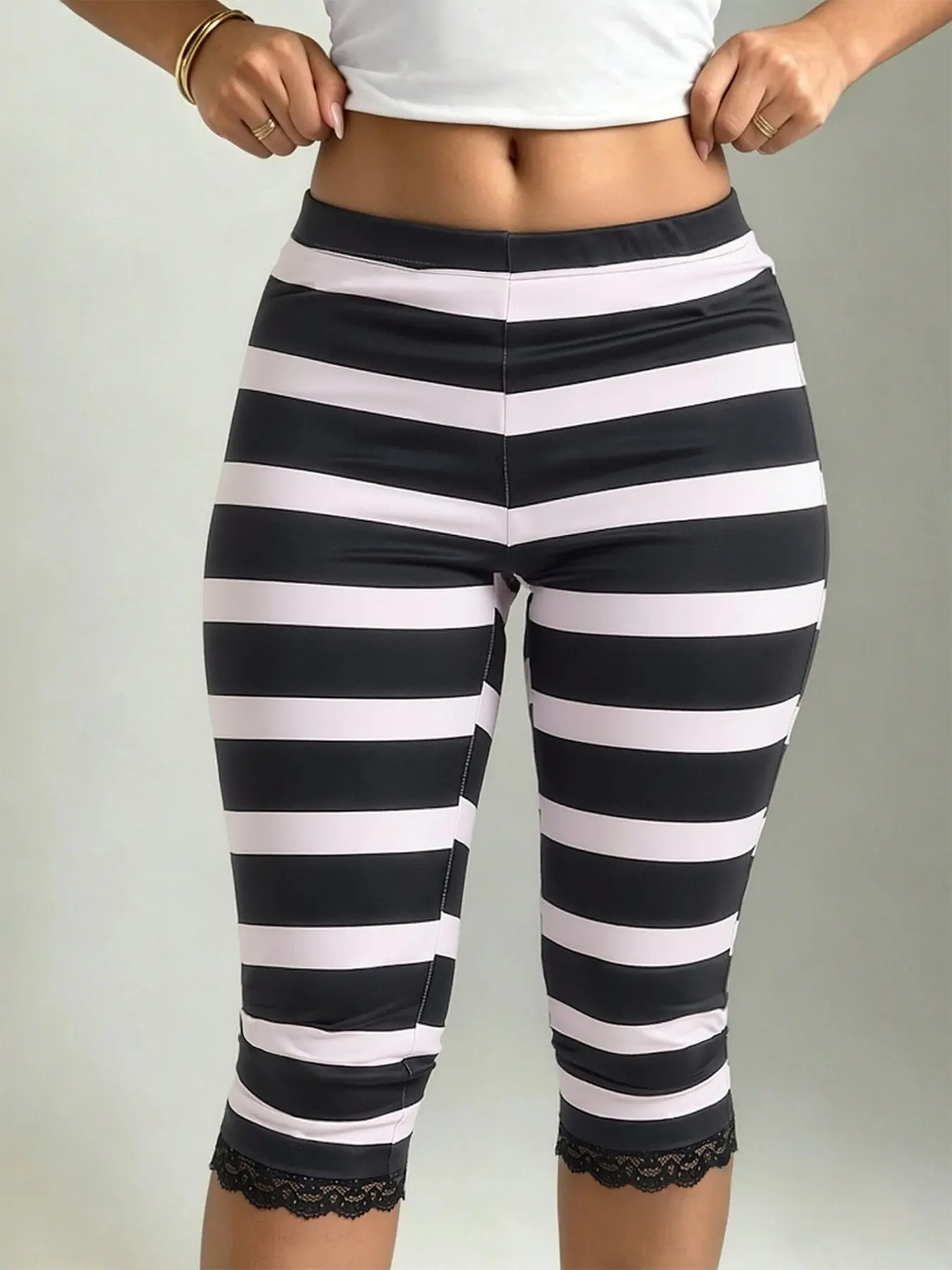 Women’s Striped Lace Hem Capri Leggings, High Waist Stretchy Crop Yoga Pants Summer Casual Streetwear 2026 Hot Search, Smooth Elastic Skinny Fabric, Wide Comfort Waistband, Classic Horizontal Stripe Pattern, Delicate Lace Trim At Cuffs, Tight Fit Sculpt