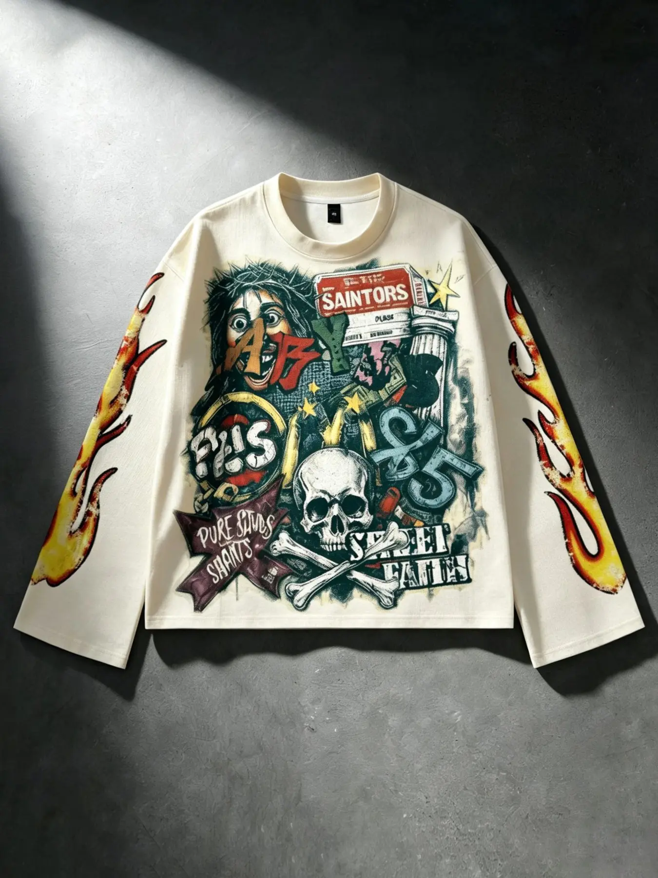 Thorn-themed long-sleeved T-shirt with crossbones and skull patchwork print; gradient flame graffiti on both sleeves; retro vintage slogan lettering; short, loose fit; unisex; casual street style; trendy street fashion; Streetwear