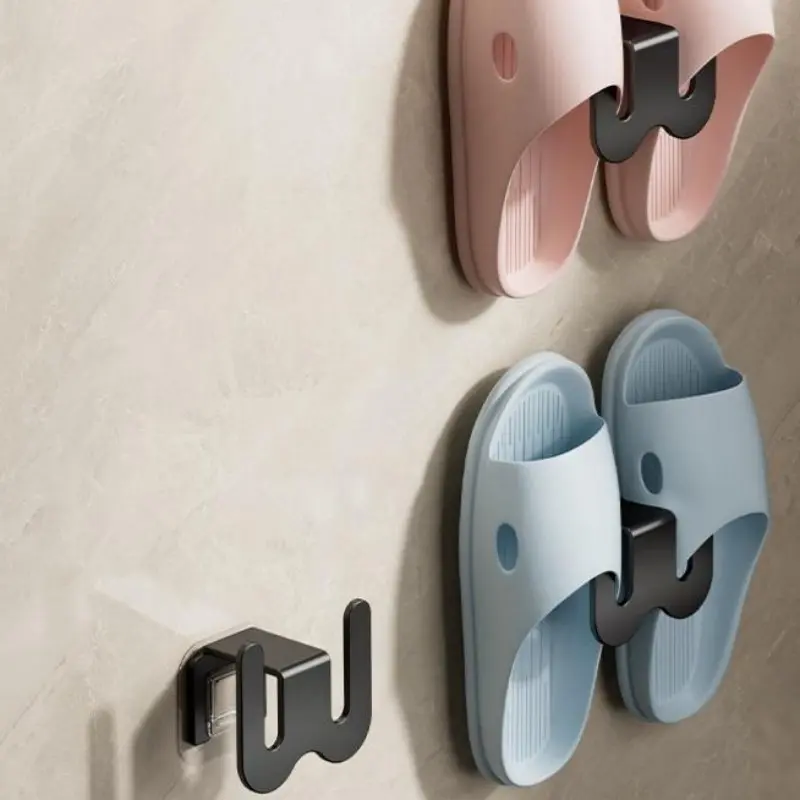 Wall-mounted shoe rack, space-saving aluminum slip-on shoe organizer, adhesive hooks for bathrooms and behind doors that don’t require drilling.