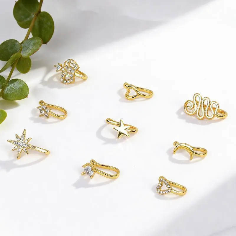 9 PCS Nose Rings for Women and Men Jewelry Shape Nose Ring Copper Non Piercing Nose Rings Set – U Shape, Star, Love, Crown Clip-On Nose Rings with Rhinestones, Copper Body Jewelry for Men & Women, Stylish Gold Septum Accessories