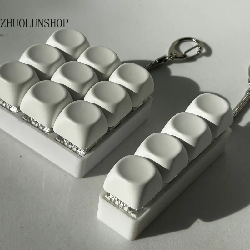 9 Keys Eco-Friendly Keyboard Fidget Clicker Keychain, Crisp Tactile ASMR Relax Sensory Toy for Adults Unisex, Soft Smooth Silicone ABS Material, Vintage Mini Keyboard Desk Decor Stress Relief Ornament, Ideal Holiday Gift for Stress Sufferers